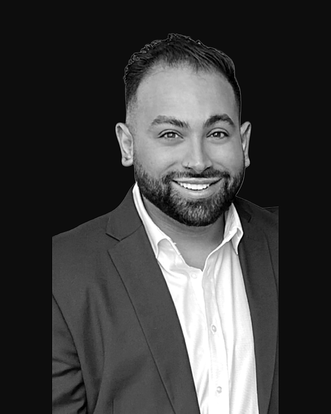 Portrait of Carlos Roman, founder of IMPAKT Aesthetics & Wellness Consulting